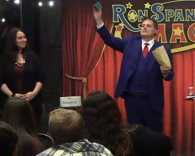 Central Ohio magician Ron Spangler performing at an office holiday party